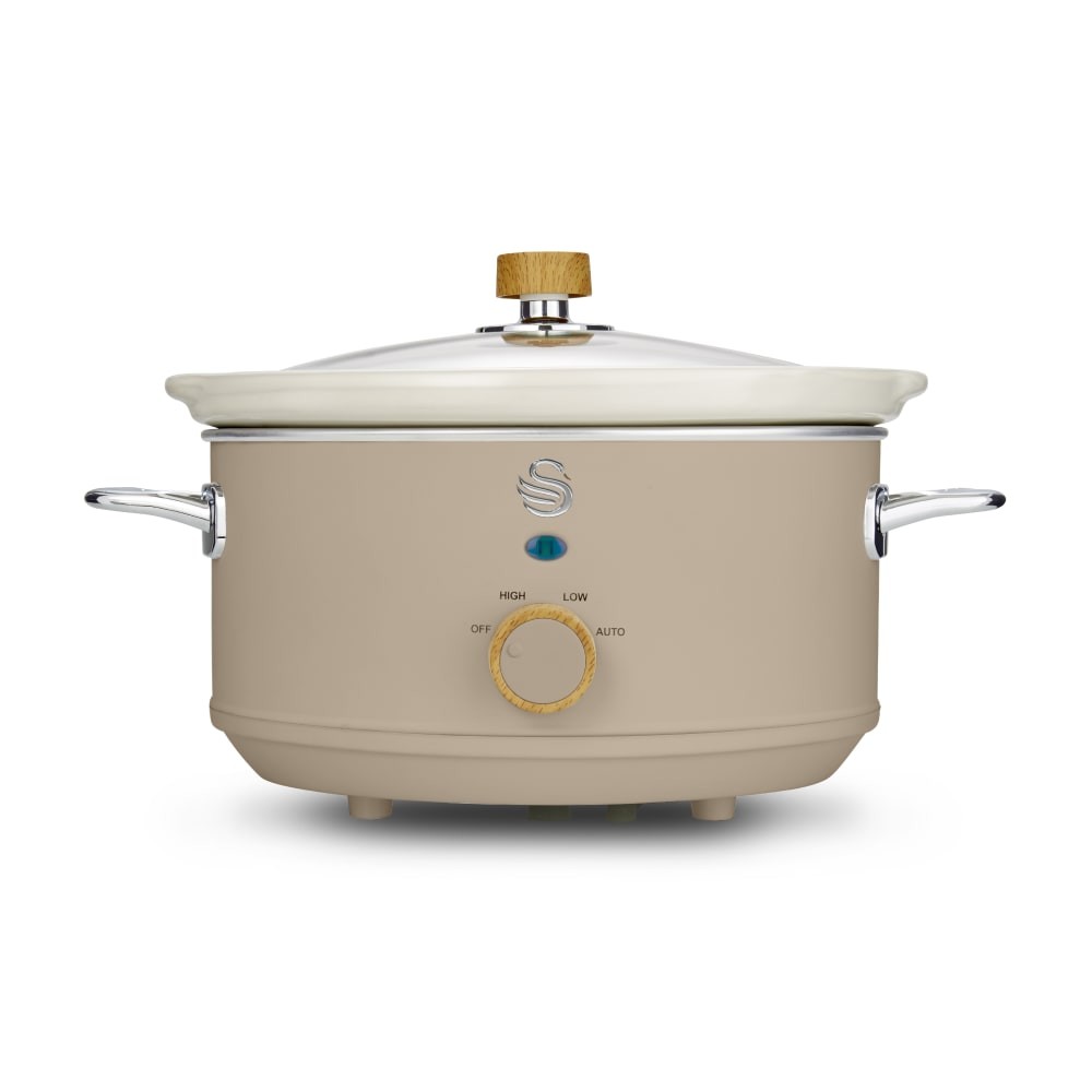 Swan 3.5L Nordic Slow Cooker in a soft beige color with a glass lid, wooden knob, and control dial featuring high, low, and auto settings.