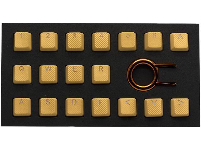 Neon orange TPR rubber keycaps with double shot design, featuring textured surfaces and backlit compatibility, arranged in a 18-key layout with a keycap puller included.