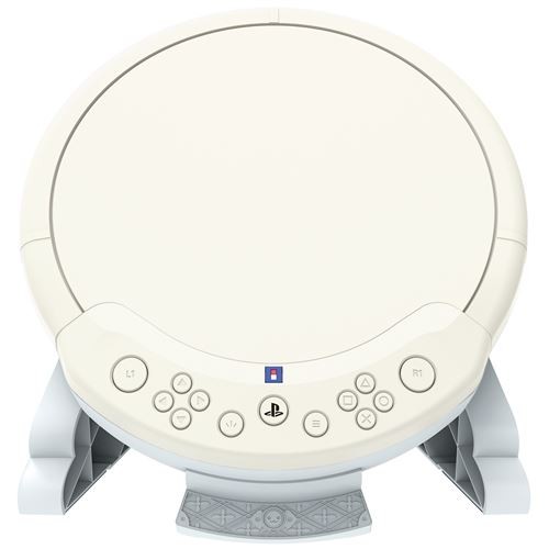 White drum controller with a circular surface, featuring PlayStation buttons and a sturdy gray base, designed for Taiko No Tatsujin on PS5.