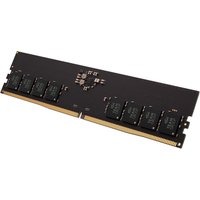 Black Team Group ELITE 32 GB DDR5 memory module with gold edge and eight visible memory chips.