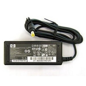 Black 65W power adapter with a rectangular design, featuring a yellow connector tip and a long cable, labeled with various technical specifications and safety icons.