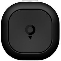 Black TomTom navigator with rounded edges, central button, and sleek compact design.