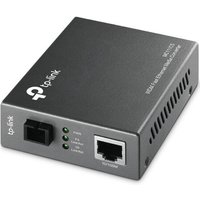 Black TP-Link MC111CS media converter with Ethernet and fiber ports, LED indicators on top.