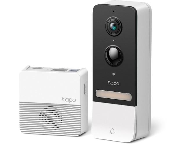 Smart battery video doorbell kit in sleek black and white design, featuring a 2K camera, two lenses, and a compact white chime with a speaker. IP64 rated for weather resistance.