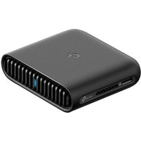 Black TP-Link TL-WR3002X wireless router, compact design, vented sides, dual-band, Gigabit Ethernet ports.