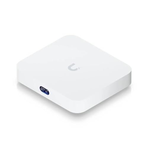 White Ubiquiti Cloud Gateway Max UCG-MAX with a smooth, flat design, featuring a subtle logo on the top and a single port on one side.