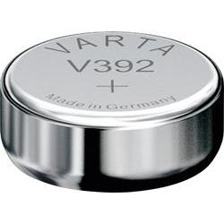 Silver round battery with a smooth metallic finish, labeled "V392" and "Made in Germany," featuring a positive (+) terminal on top.