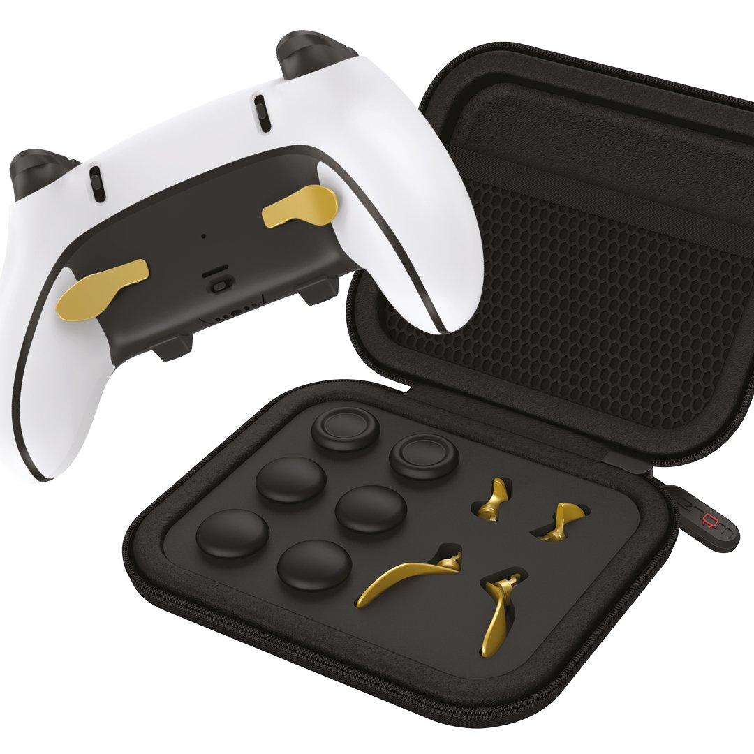 White gaming controller with black and gold analog stick grips, displayed alongside a compact black carrying case containing additional grips and accessories.