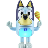 Bluey-shaped interactive toy with a light-up belly, holding a yellow and orange striped maraca.