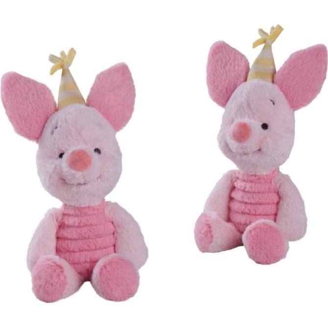 Soft, plush Piglet toy from Disney, featuring a pink body, a smiling face, and a yellow party hat with white stripes, measuring 25cm tall.