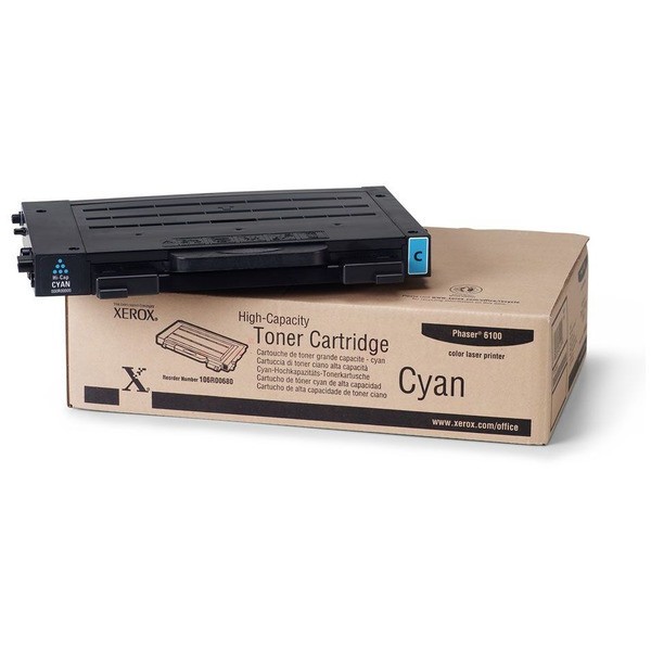 Cyan toner cartridge in a black casing with blue accents, placed on a brown box labeled "Cyan" and "Phaser 6100," indicating high-capacity for 5,000 pages at 5% coverage.