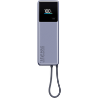Silver Xiaomi 165W power bank with integrated cable, 10000mAh capacity, digital display showing charge percentage.