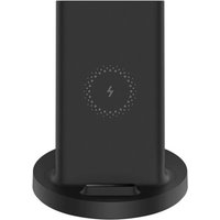 Black Xiaomi Mi 20W wireless charger with circular charging symbol on a round base.