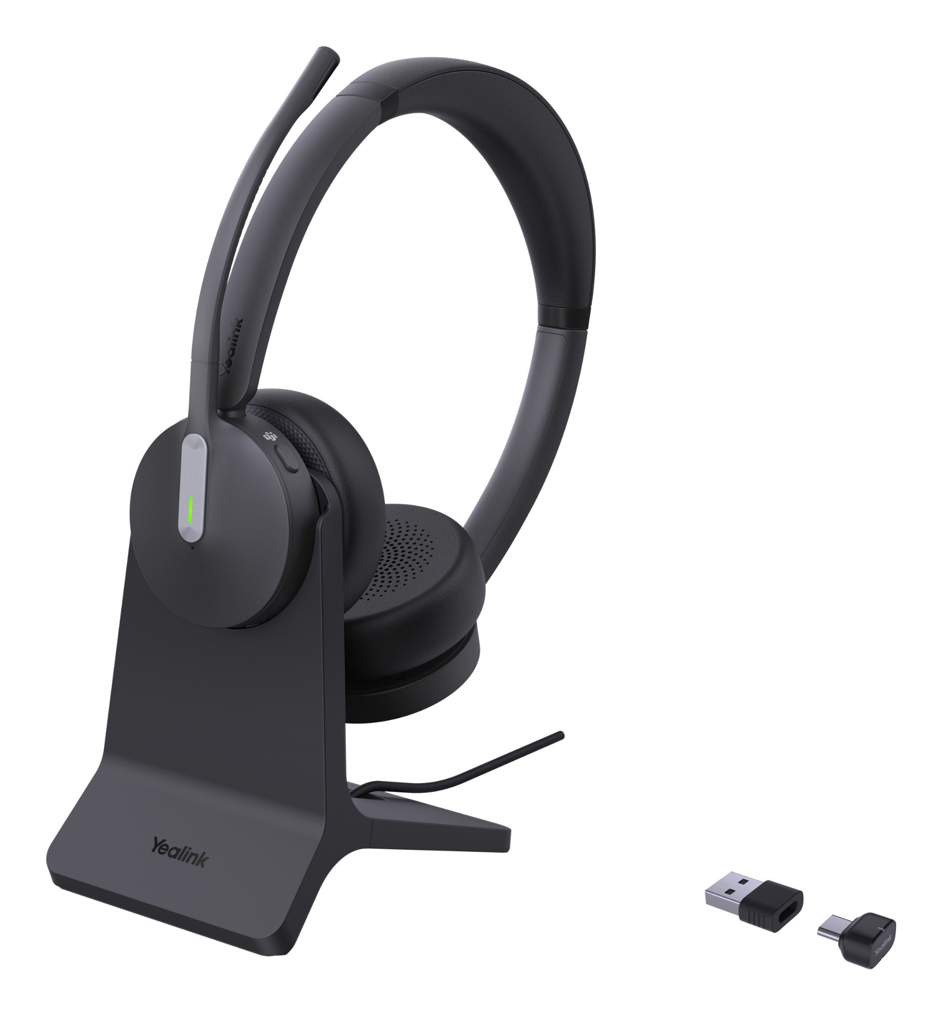 Yealink BH70 Dual headset in sleek black with soft ear cushions, adjustable headband, and a detachable microphone, accompanied by a charging stand and USB-C dongle.