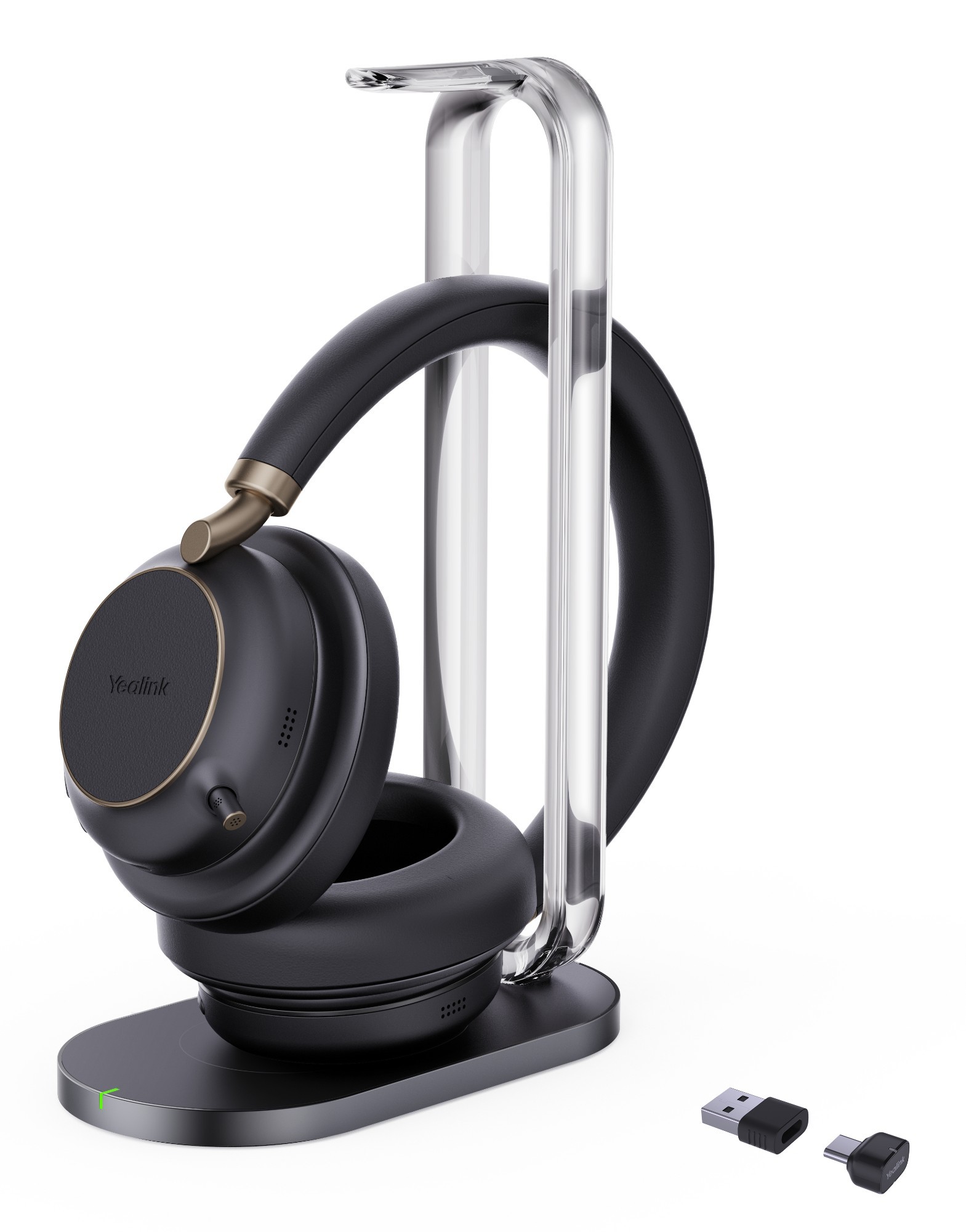 Yealink BH76 Plus headset in black with a sleek charging stand, featuring a cushioned ear cup, USB-C connection, and two wireless adapters for versatile connectivity.