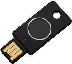 Black USB-A security key with a circular button and a small LED indicator, featuring a sleek design and gold contact pins for secure workstation access.