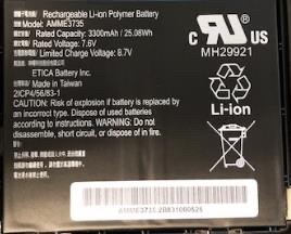 Black rechargeable lithium-ion battery with specifications, including model number AMME3735, rated capacity 3300mAh, and voltage details, featuring safety and disposal warnings.