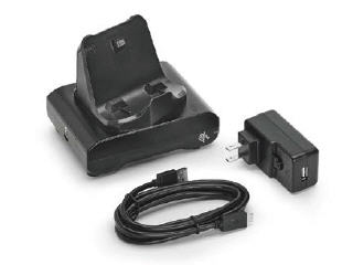 Black charging dock with a slot for the printer/scanner, accompanied by a black power adapter and a USB cable, all designed for Zebra devices.