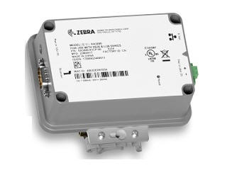 Zebra EA3600-T1CP-00 barcode reader accessory in a gray casing, featuring multiple ports and a barcode label on the underside, designed for connectivity and functionality.