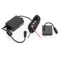 Black Zebra P1050667-140 printer accessory with power adapter, long cable, and connector.