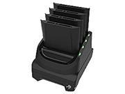 Black Zebra SAC-TC51-4SCHG-01 battery charger with four slots for charging, featuring LED indicators on the front for charging status.