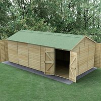 Black grid-style 20x10 plastic shed base kit on grass, designed for stability and drainage.