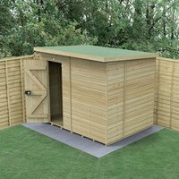 Black grid-patterned plastic shed base kit with interlocking panels on grass, designed for an 8x6 shed.