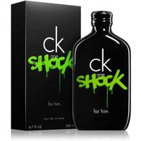 Black CK ONE SHOCK FOR HIM bottle with green graffiti text, next to matching black box, 100ml eau de toilette.