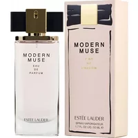Clear glass bottle with gold cap and black bow, Estée Lauder Modern Muse Eau De Parfum 50ml, next to matching box.