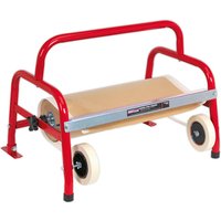 Red Sealey MK65 floor-mounted masking paper dispenser with metal frame and wheels, holding a roll of brown paper.