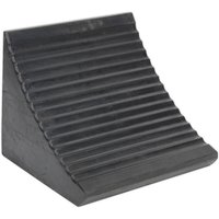 Black Sealey heavy-duty rubber wheel chock with ribbed surface and triangular shape.