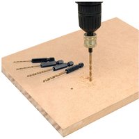 7-piece Trend Snappy hex drill set with black hex shanks and gold drill bits, drilling into wood.