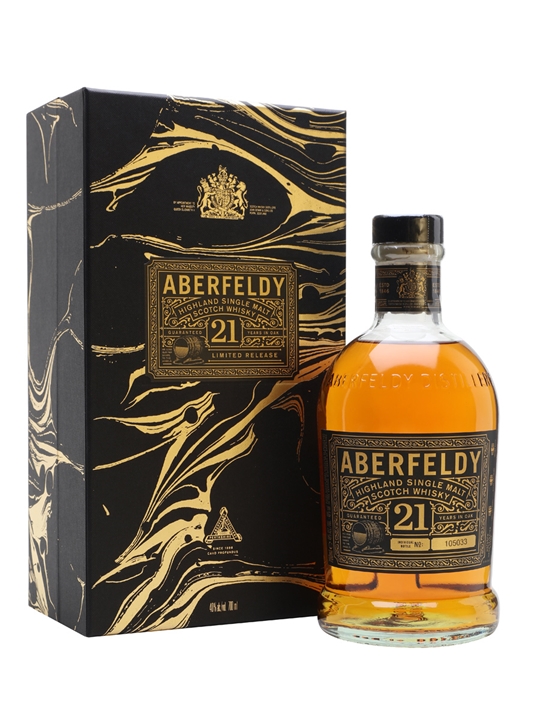 Golden whisky bottle with a round shape, labeled "Aberfeldy 21," inside a sleek black gift box featuring gold marbled design and embossed text.