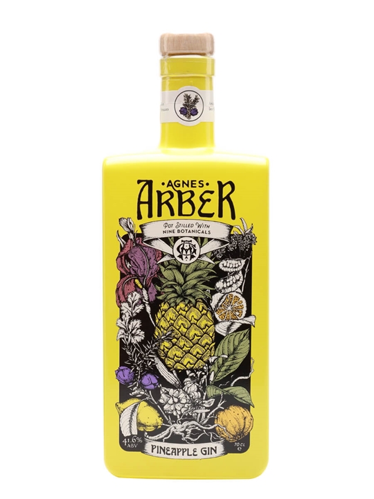 Bright yellow bottle of Agnes Arber Pineapple Gin, featuring intricate botanical illustrations, including a pineapple, flowers, and citrus, with a cork stopper and a label displaying the brand name.