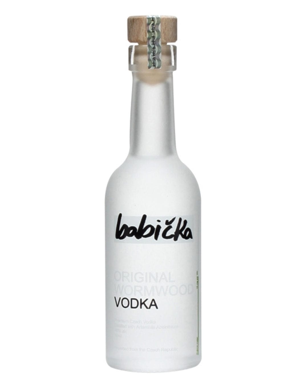 Clear glass miniature bottle of Babicka Original Wormwood Vodka, 5 Cl, featuring a cork stopper and a minimalist label with black text on a frosted background.