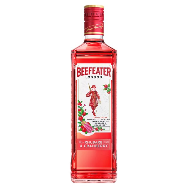 Clear glass bottle of Beefeater Rhubarb & Cranberry Gin, featuring a vibrant pink liquid, a white label with red accents, and an illustration of a Beefeater guard.