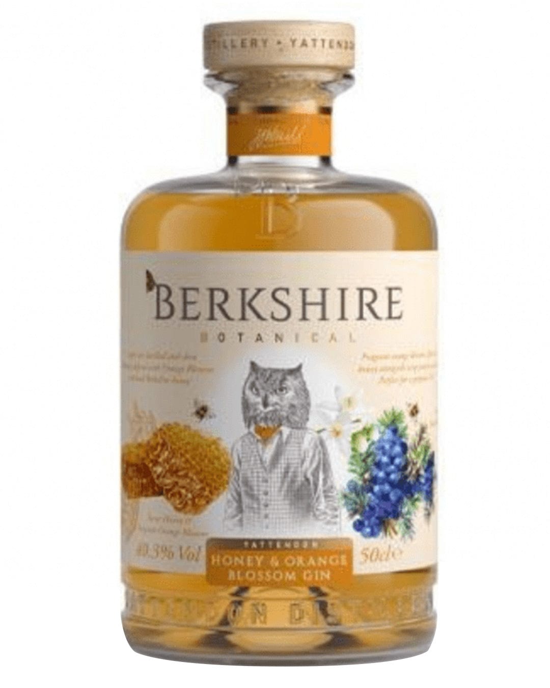 Clear glass bottle filled with golden honey-colored gin, featuring a whimsical label with an owl in a suit, honeycomb, and blue flowers, labeled "Berkshire Botanical Honey & Orange Blossom Gin."