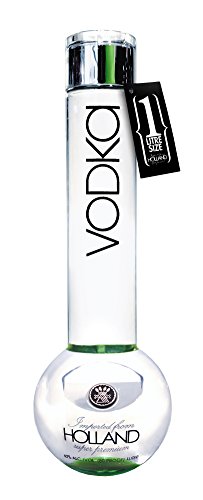Clear glass bottle with a distinctive round base and elongated neck, labeled "VODKA" prominently, featuring a green accent and a tag reading "Ultra Pure" from Holland.
