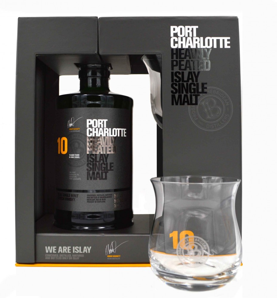 A black gift box containing a bottle of Bruichladdich Port Charlotte 10 Year Whisky and a glass, featuring bold white and orange text on the packaging.