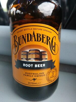 Bundaberg Root Beer bottle with a brown glass finish, featuring an orange label with black text, depicting barrels, and indicating "375 mL" and "Australian Family Owned."