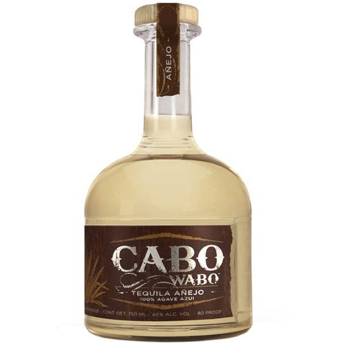 Clear glass bottle with a rounded shape, featuring a cork stopper, labeled "CABO WABO" in bold white letters, and "Tequila Anejo" in smaller text, showcasing a light amber liquid inside.