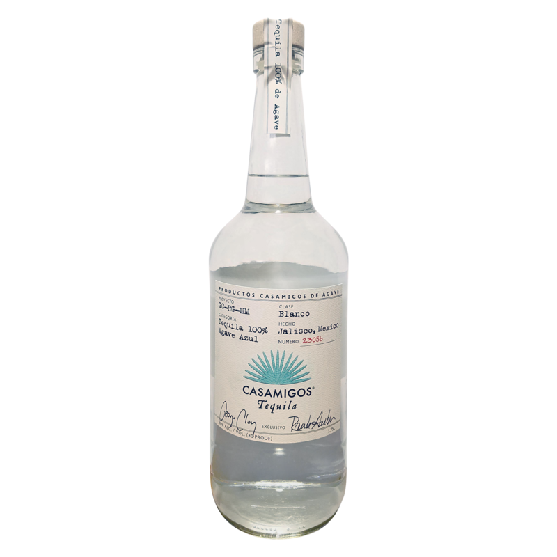 Clear glass bottle of Casamigos Blanco Tequila, 1.75 L, featuring a silver label with blue and black text, and a cork stopper at the top.