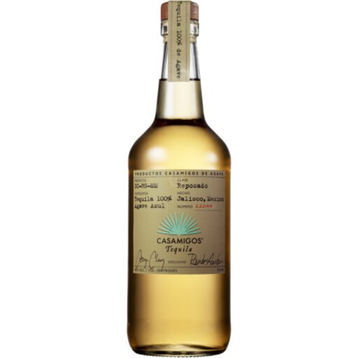 Casamigos Reposado Tequila bottle, 1.75 L, features a clear glass design with a cork stopper, light amber liquid, and a label with elegant script and gold accents.