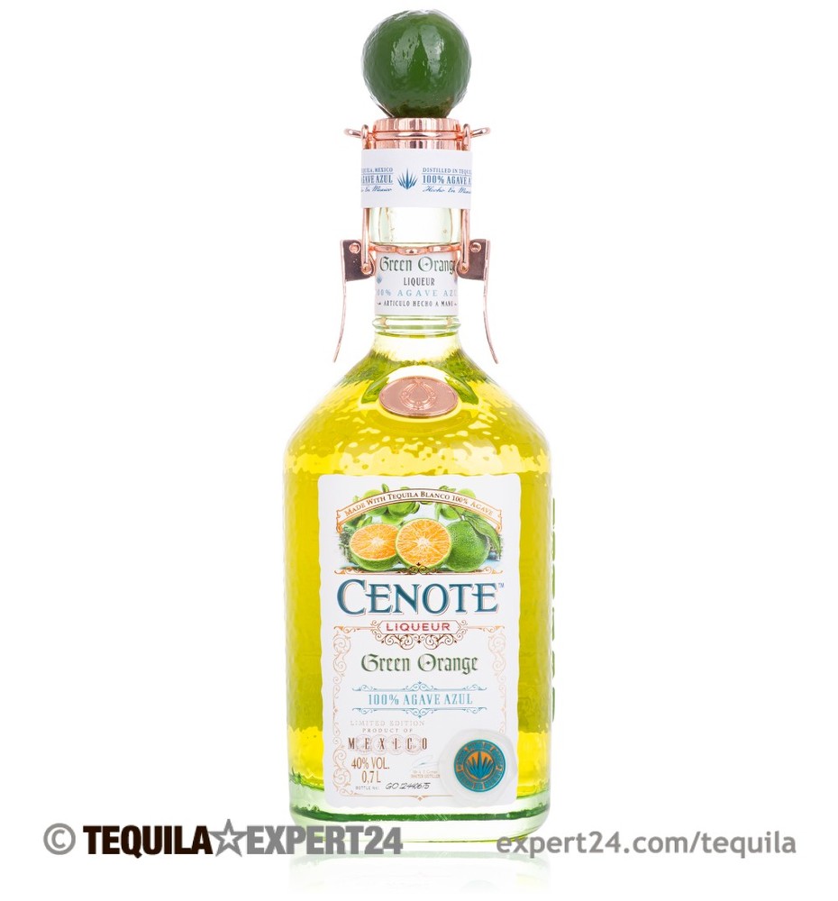 Cenote Green Orange Tequila Liqueur in a clear glass bottle with a green and gold label, featuring a copper cap and a round green stopper, showcasing vibrant yellow liquid inside.
