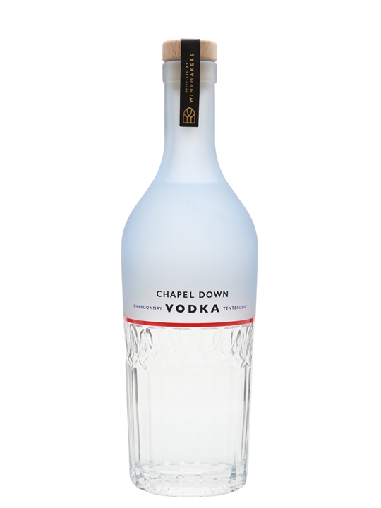 Frosted glass bottle with a wooden cork, featuring a clear base and a label that reads "Chapel Down Chardonnay Vodka" in bold black letters.