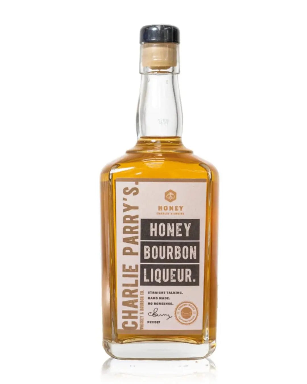 Clear glass bottle of Charlie Parry's Honey Bourbon Liqueur, featuring a light amber liquid, a cork stopper, and a cream and brown label with bold text.