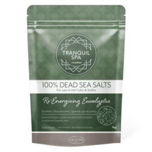 Green and silver packaging featuring "Tranquil Spa 100% Dead Sea Salts" with eucalyptus scent, labeled for use in hot tubs and baths, weighing 1 kg.