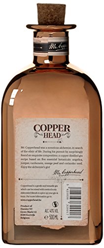A clear glass bottle of Copperhead Classic Gin with a cork stopper, featuring a copper-toned label and a vintage design, holding 50 cl of gin at 40% alcohol by volume.