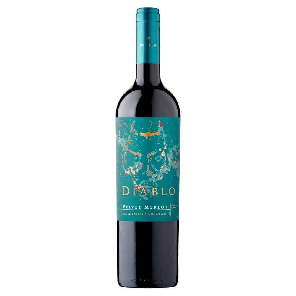 Diablo Velvet Merlot red wine bottle features a sleek dark glass design with a turquoise label, showcasing vibrant colors and artistic patterns, holding 75cl of wine.