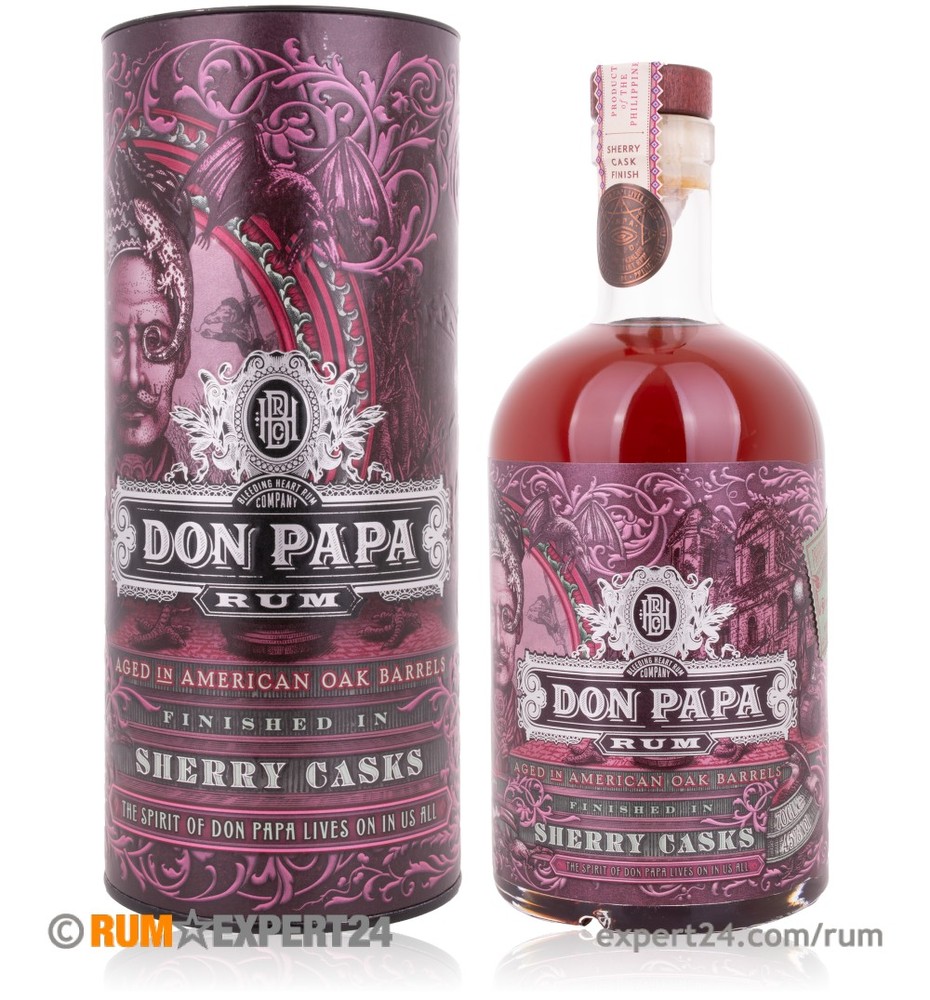 Don Papa Sherry Cask Rum in a clear glass bottle with a deep amber hue, featuring ornate purple packaging with intricate designs and text highlighting "Sherry Casks."